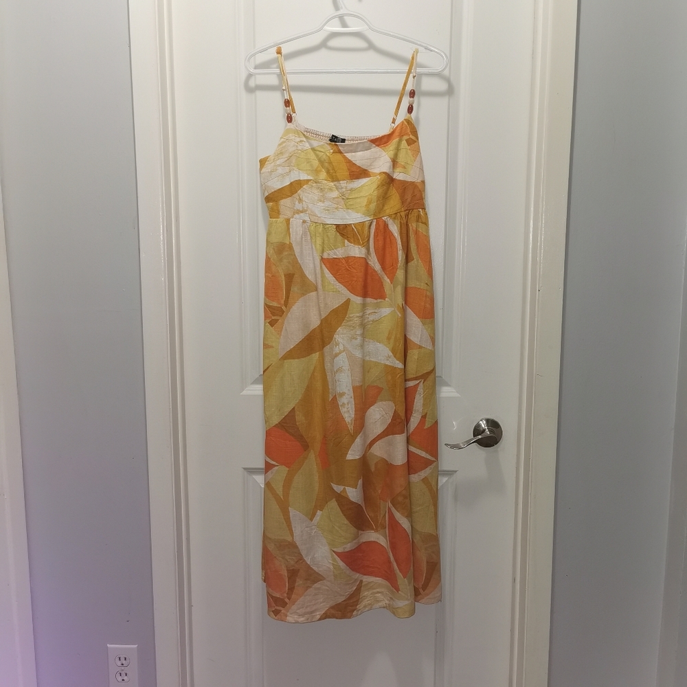 Womens Yellow Beach dress with pockets and beaded accents on strap. Linen blend‎